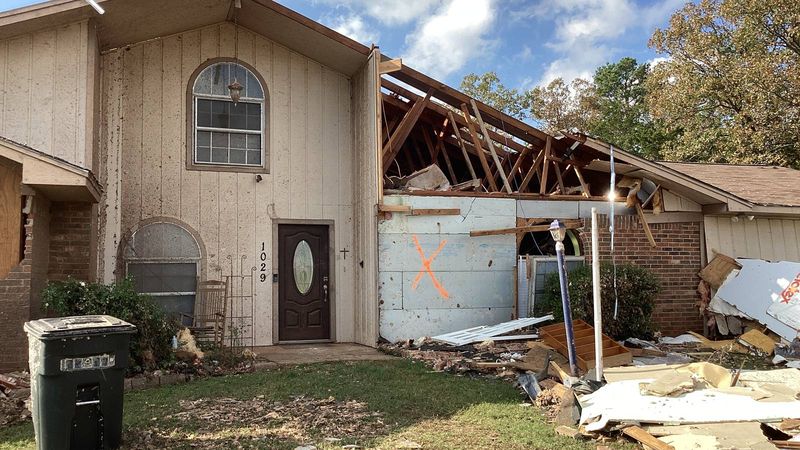 Two-story home with its roof torn off by an EF2 tornado in Hughes Springs, Texas