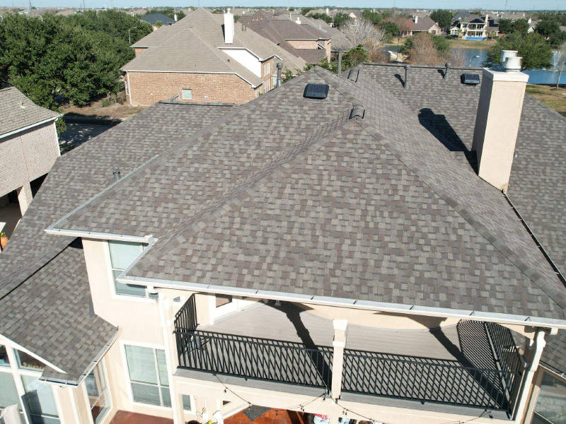 Two-Story Roof Replacement & Chimney Stucco Repair — Houston, TX