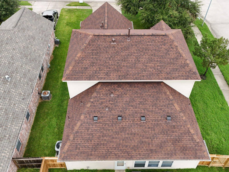 Full Roof Replacement in Warm Brown Tones — Spring, TX
