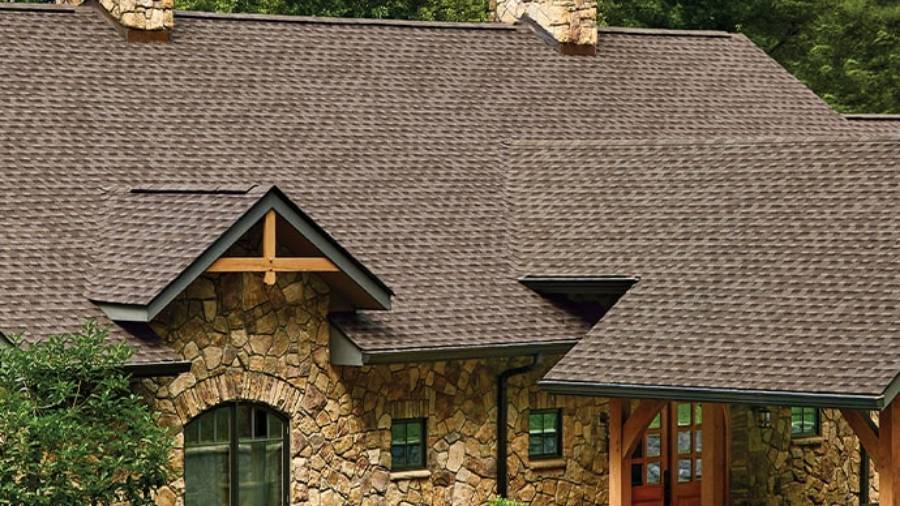 A finished roof in GAF Timberline HDZ Mission Brown on a home